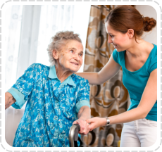 an old woman guided by her caretaker walking